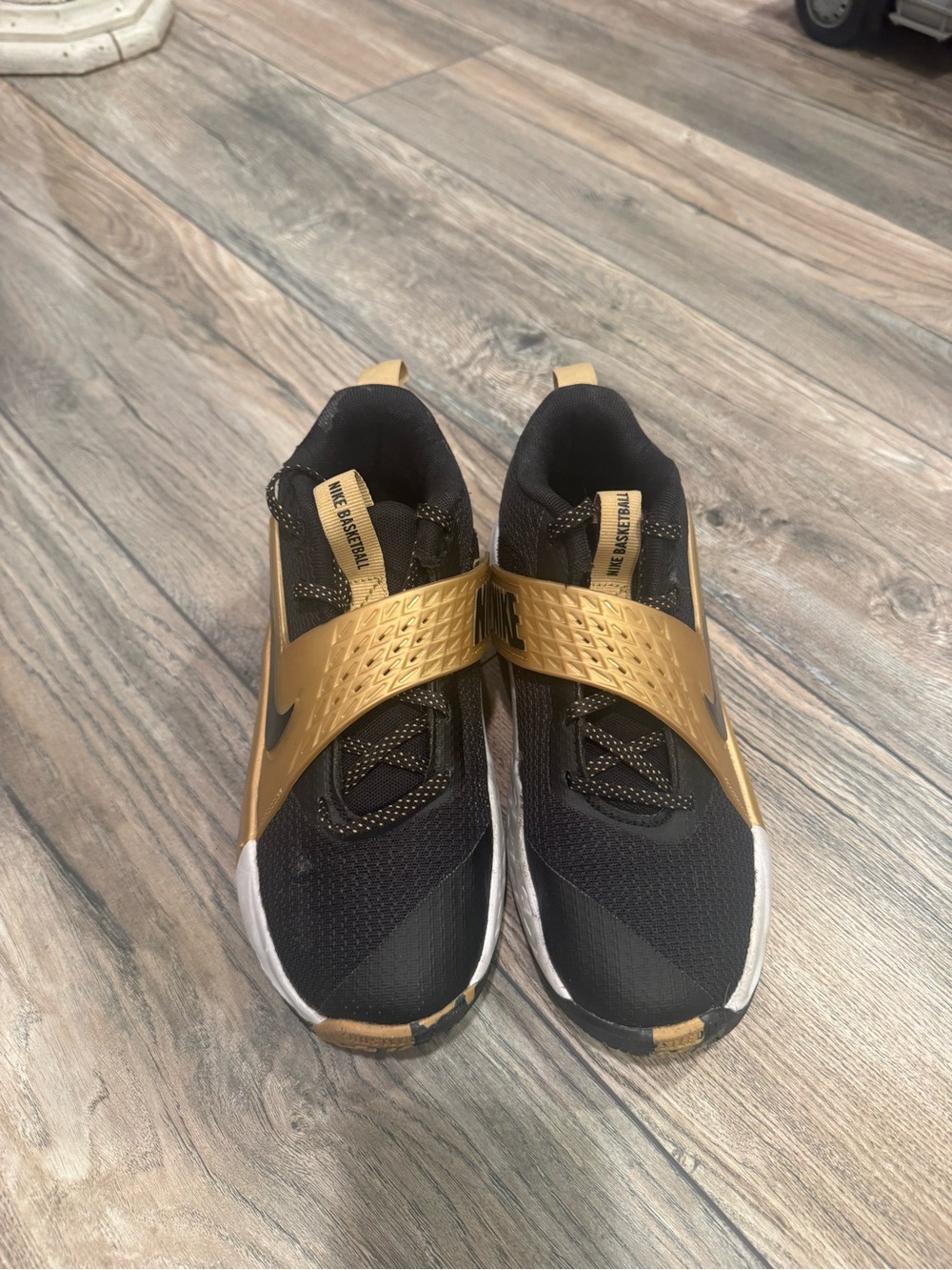 Nike Kids Black and Gold Slip-On Training Sneakers